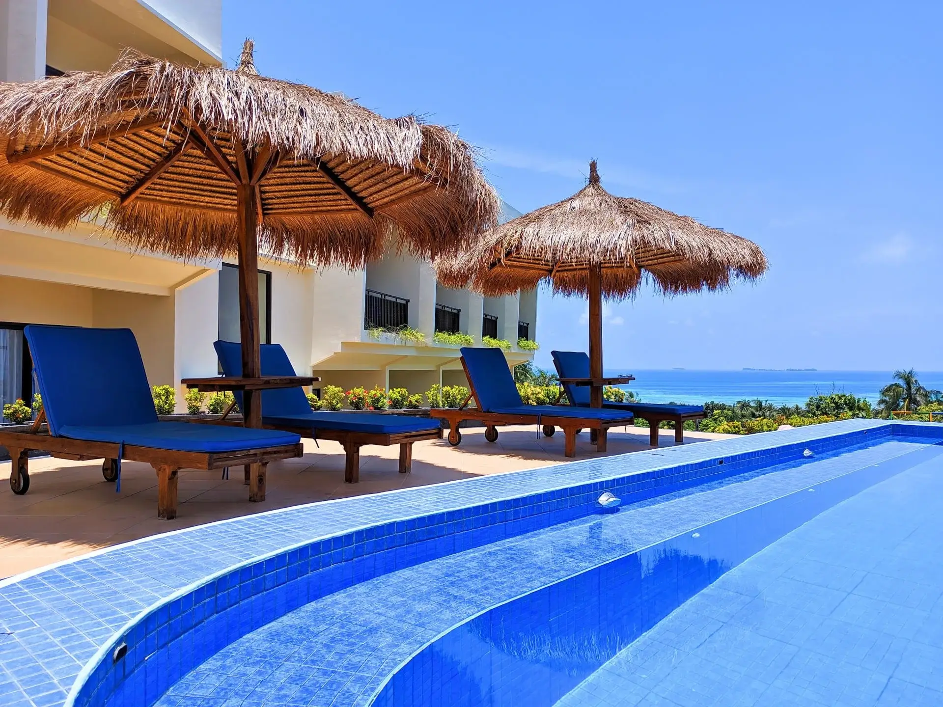 The Happinezz Hills hilltop pool overlooking the ocean